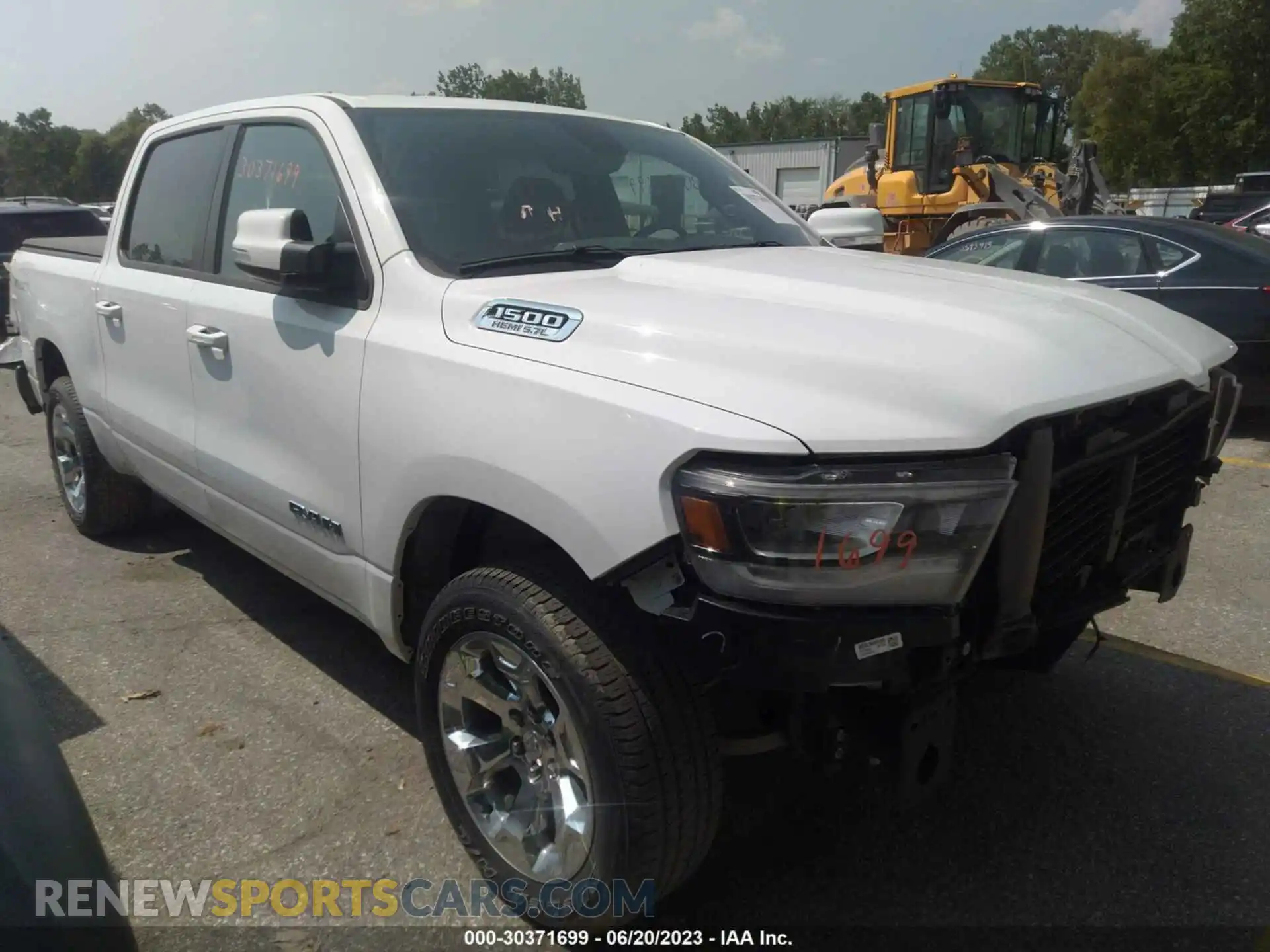 1 Photograph of a damaged car 1C6SRFFT7LN108696 RAM 1500 2020