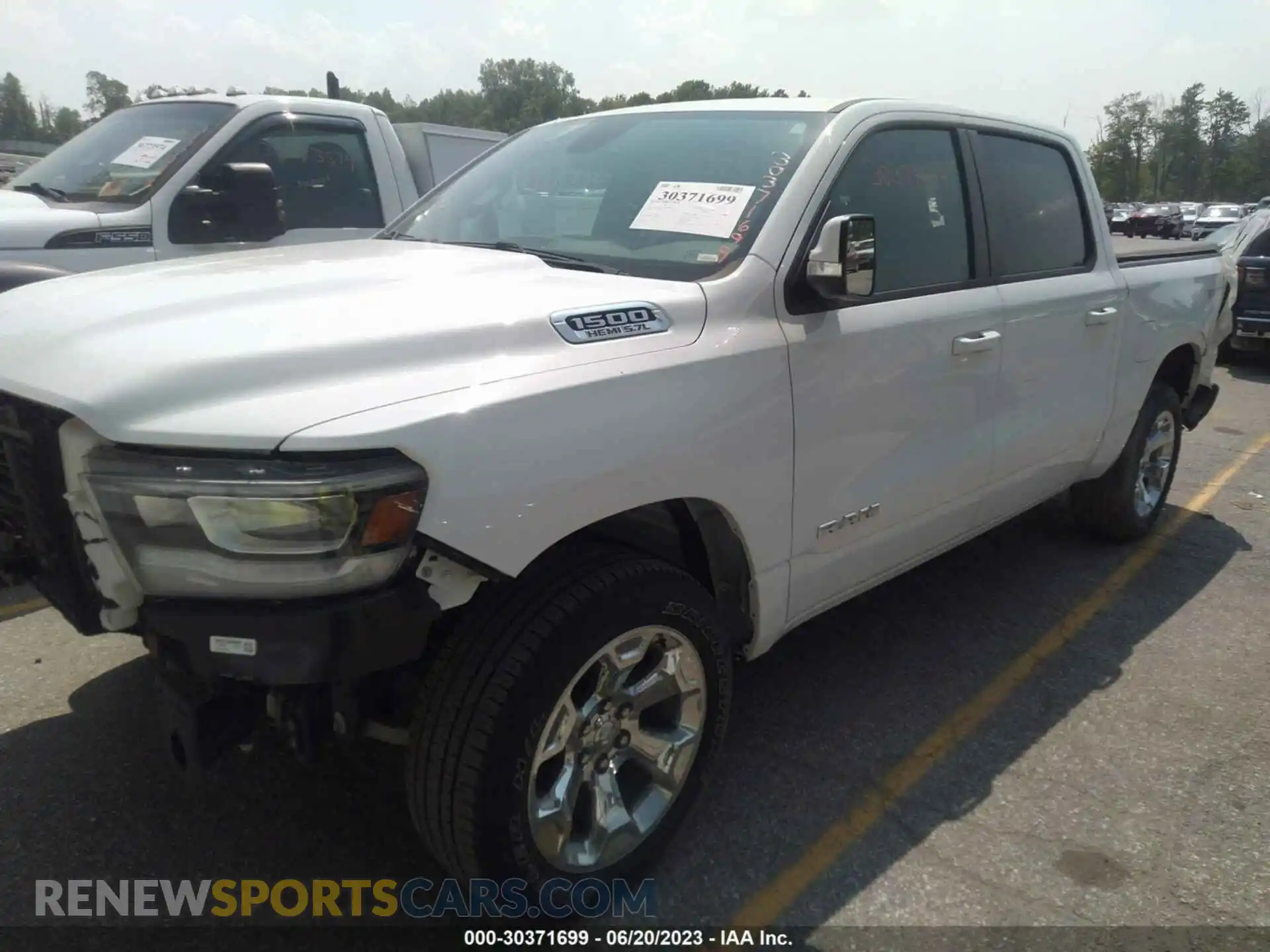 2 Photograph of a damaged car 1C6SRFFT7LN108696 RAM 1500 2020
