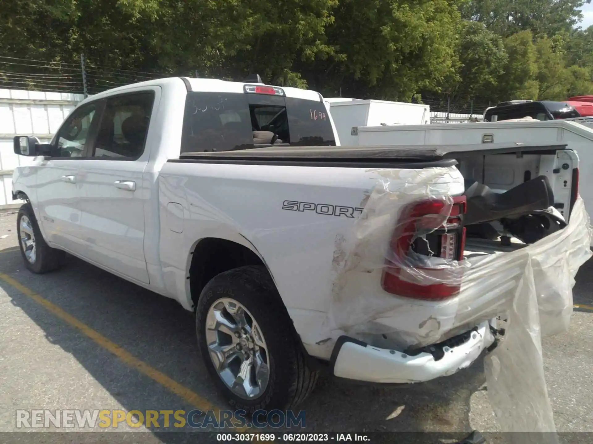 3 Photograph of a damaged car 1C6SRFFT7LN108696 RAM 1500 2020