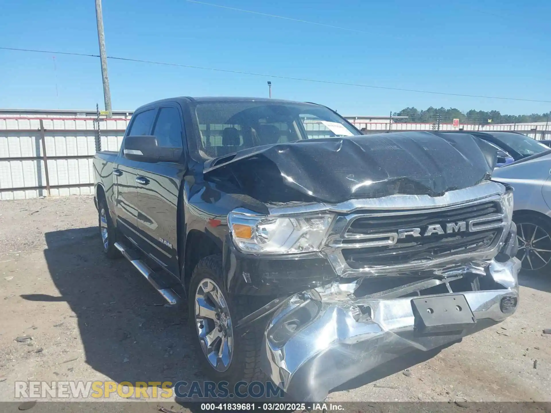 1 Photograph of a damaged car 1C6SRFFT7LN137051 RAM 1500 2020
