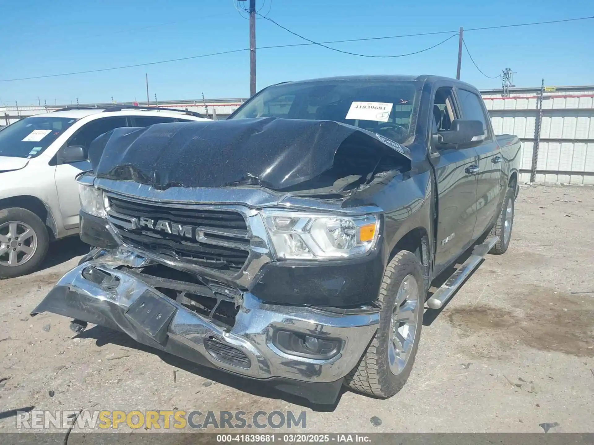2 Photograph of a damaged car 1C6SRFFT7LN137051 RAM 1500 2020