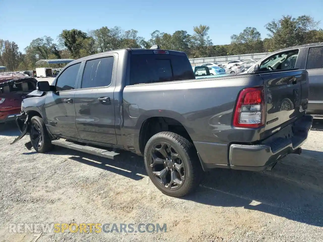 2 Photograph of a damaged car 1C6SRFFT7LN220348 RAM 1500 2020