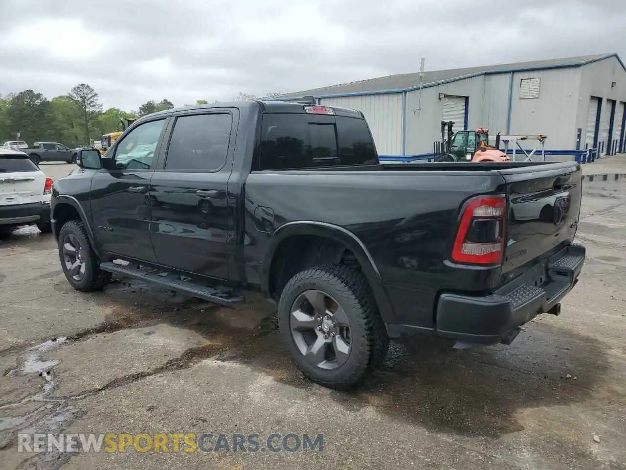 2 Photograph of a damaged car 1C6SRFFT7LN265273 RAM 1500 2020