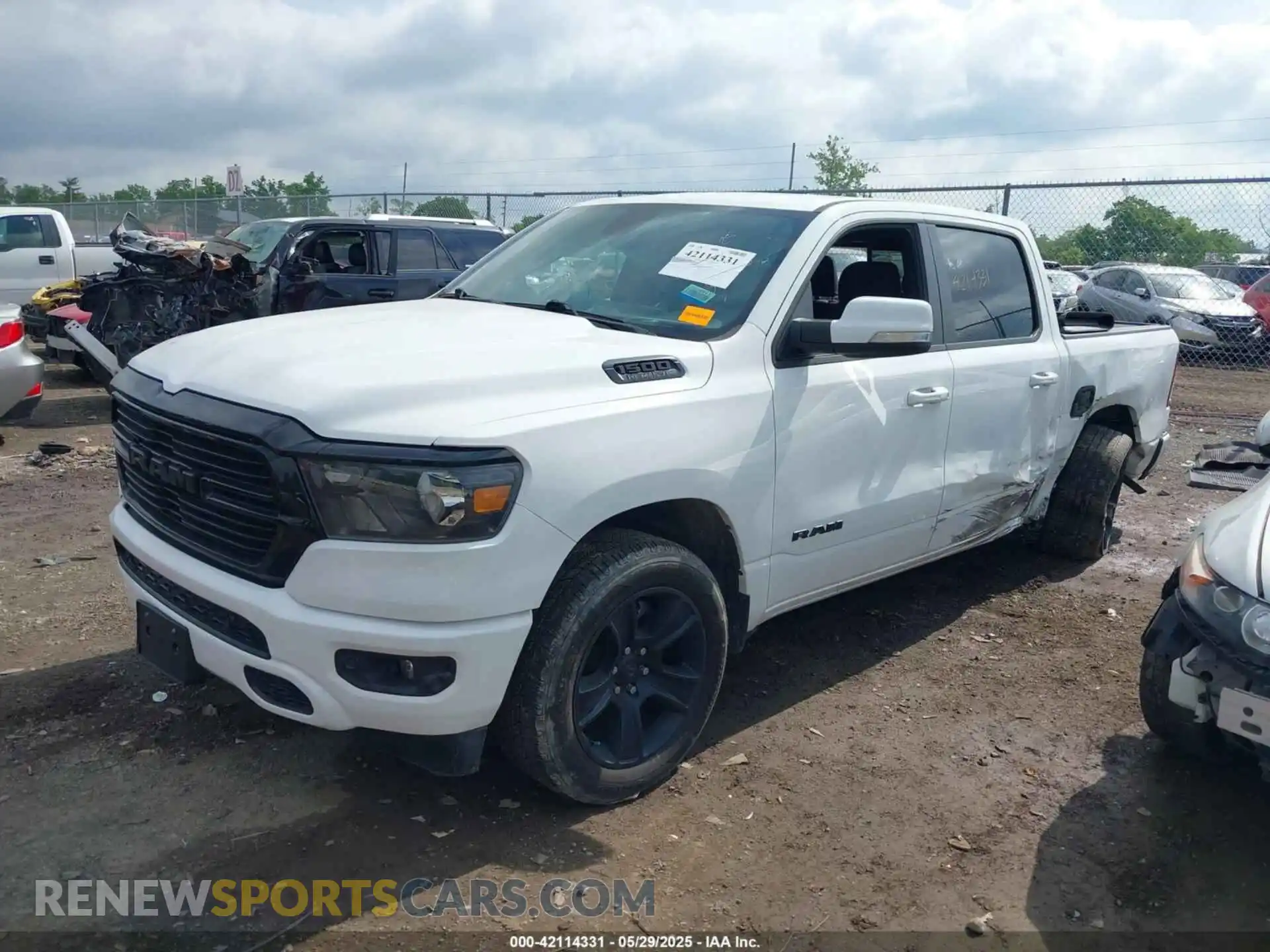 2 Photograph of a damaged car 1C6SRFFT7LN327786 RAM 1500 2020