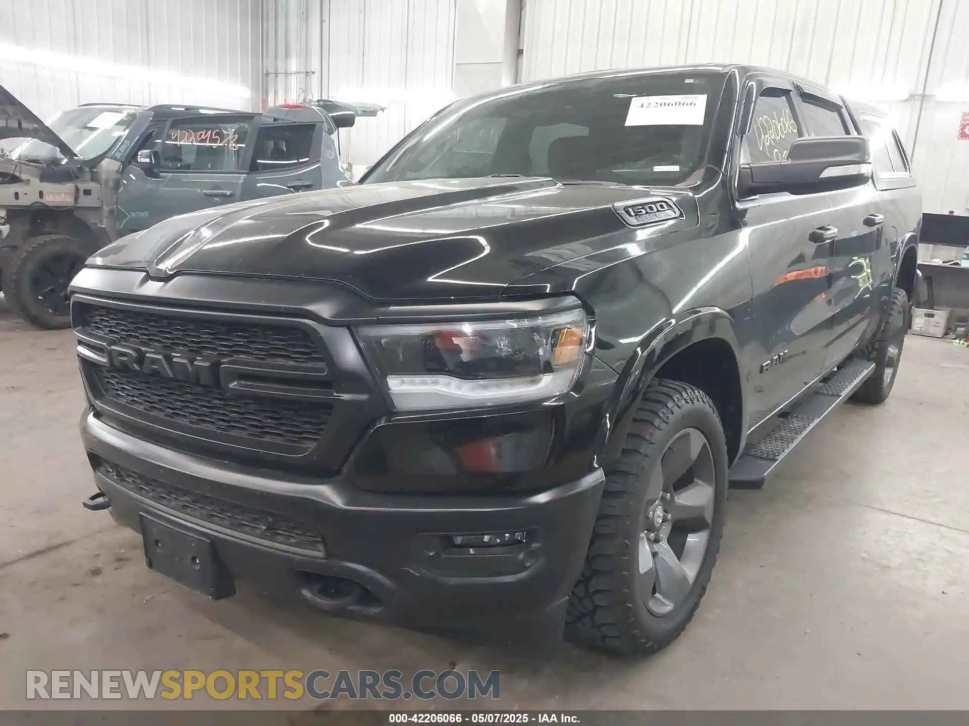 2 Photograph of a damaged car 1C6SRFFT8LN308129 RAM 1500 2020