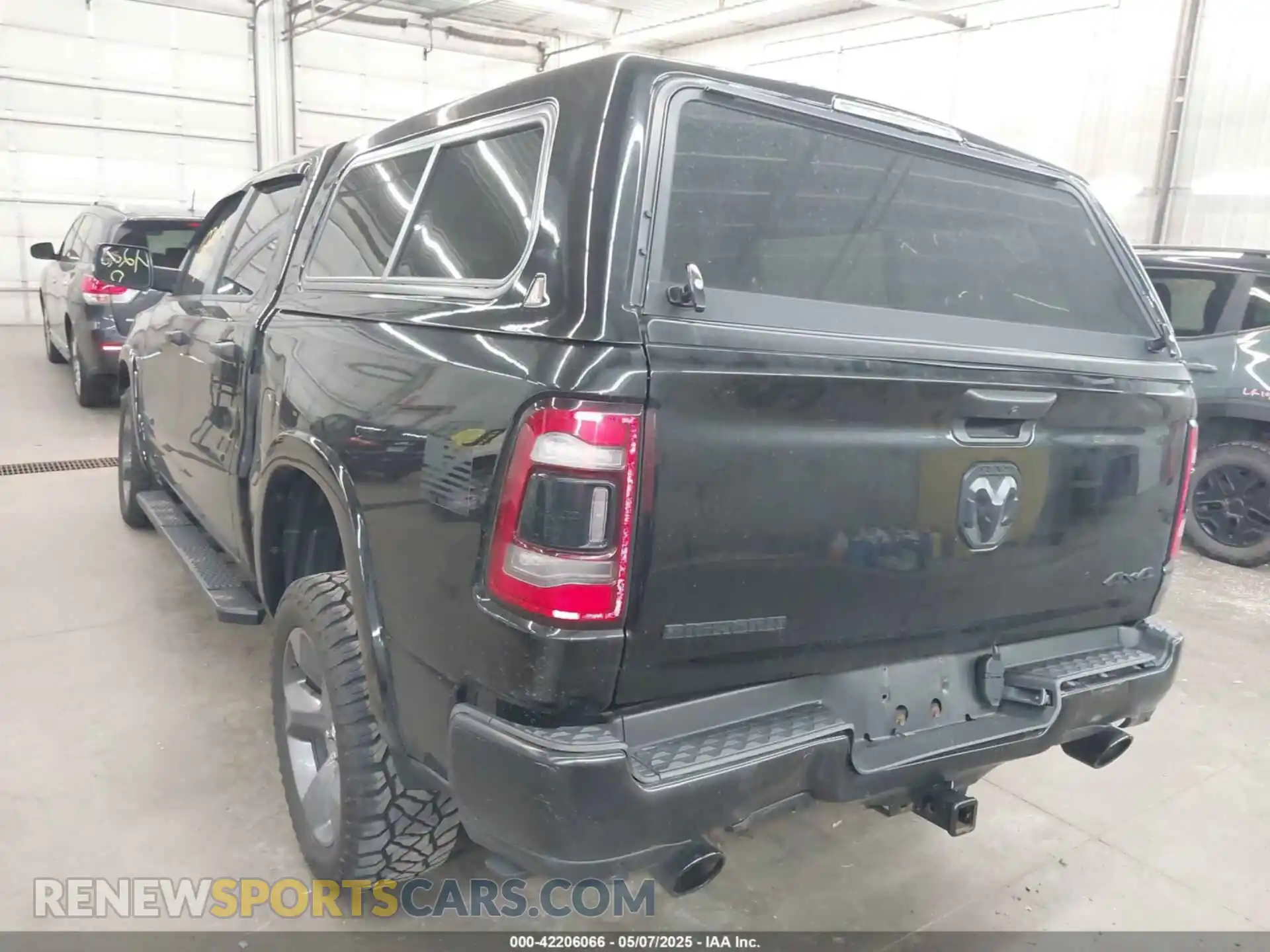 3 Photograph of a damaged car 1C6SRFFT8LN308129 RAM 1500 2020