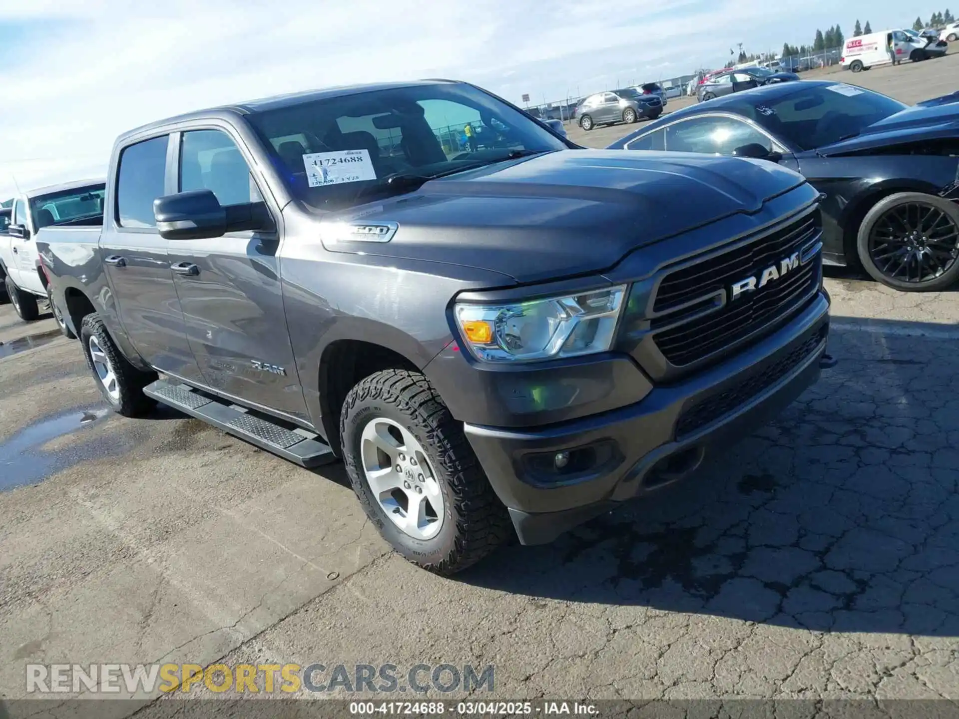 1 Photograph of a damaged car 1C6SRFFTXLN107042 RAM 1500 2020