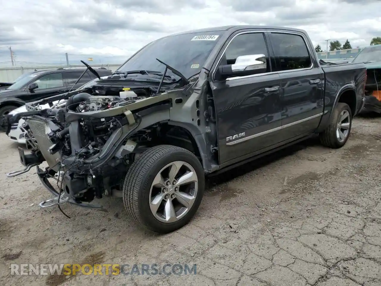 1 Photograph of a damaged car 1C6SRFHT0LN104647 RAM 1500 2020