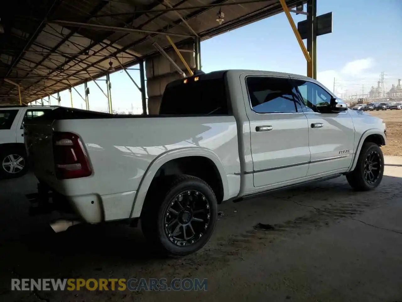 3 Photograph of a damaged car 1C6SRFHT0LN314262 RAM 1500 2020
