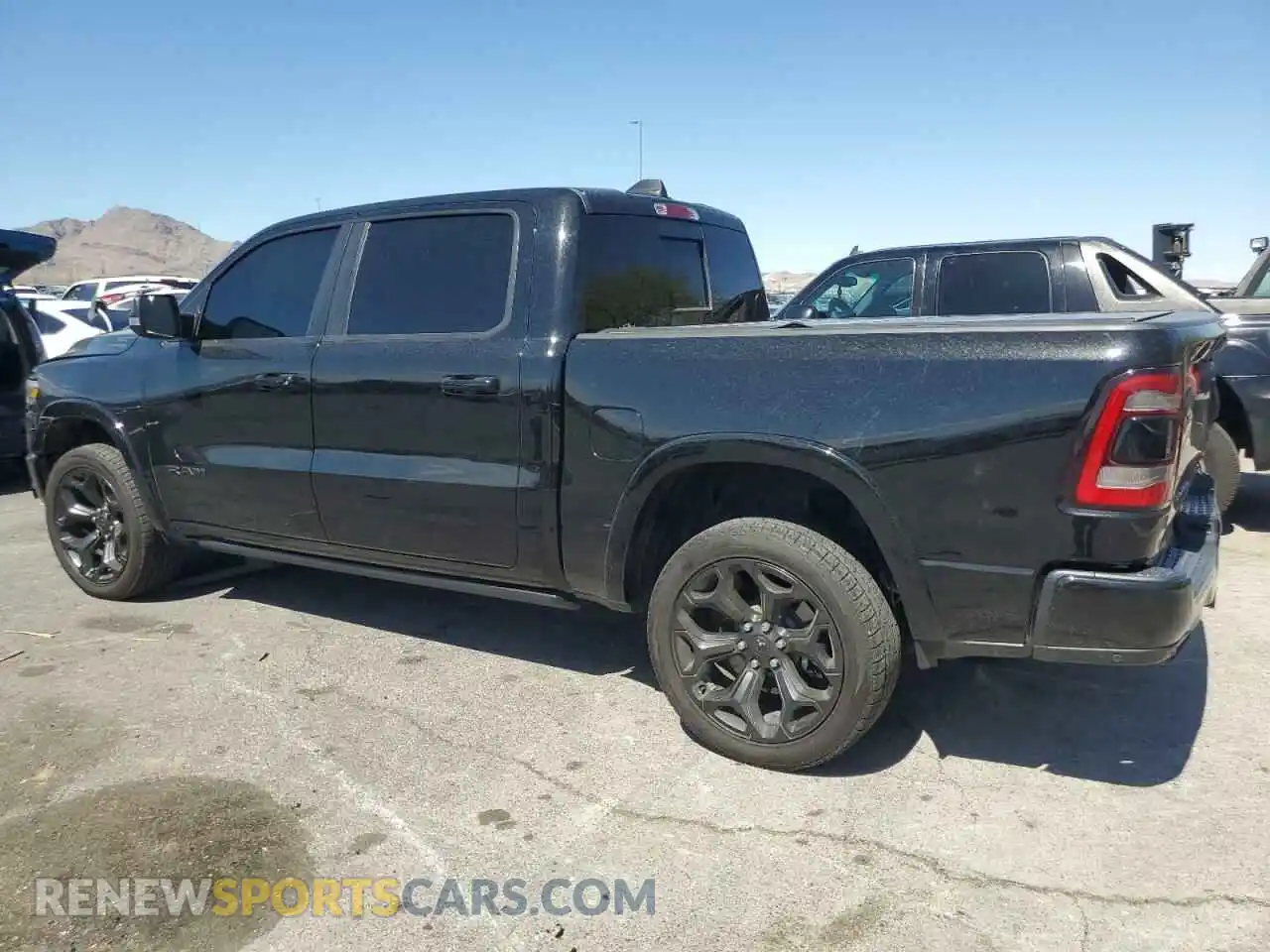 2 Photograph of a damaged car 1C6SRFHT8LN143258 RAM 1500 2020