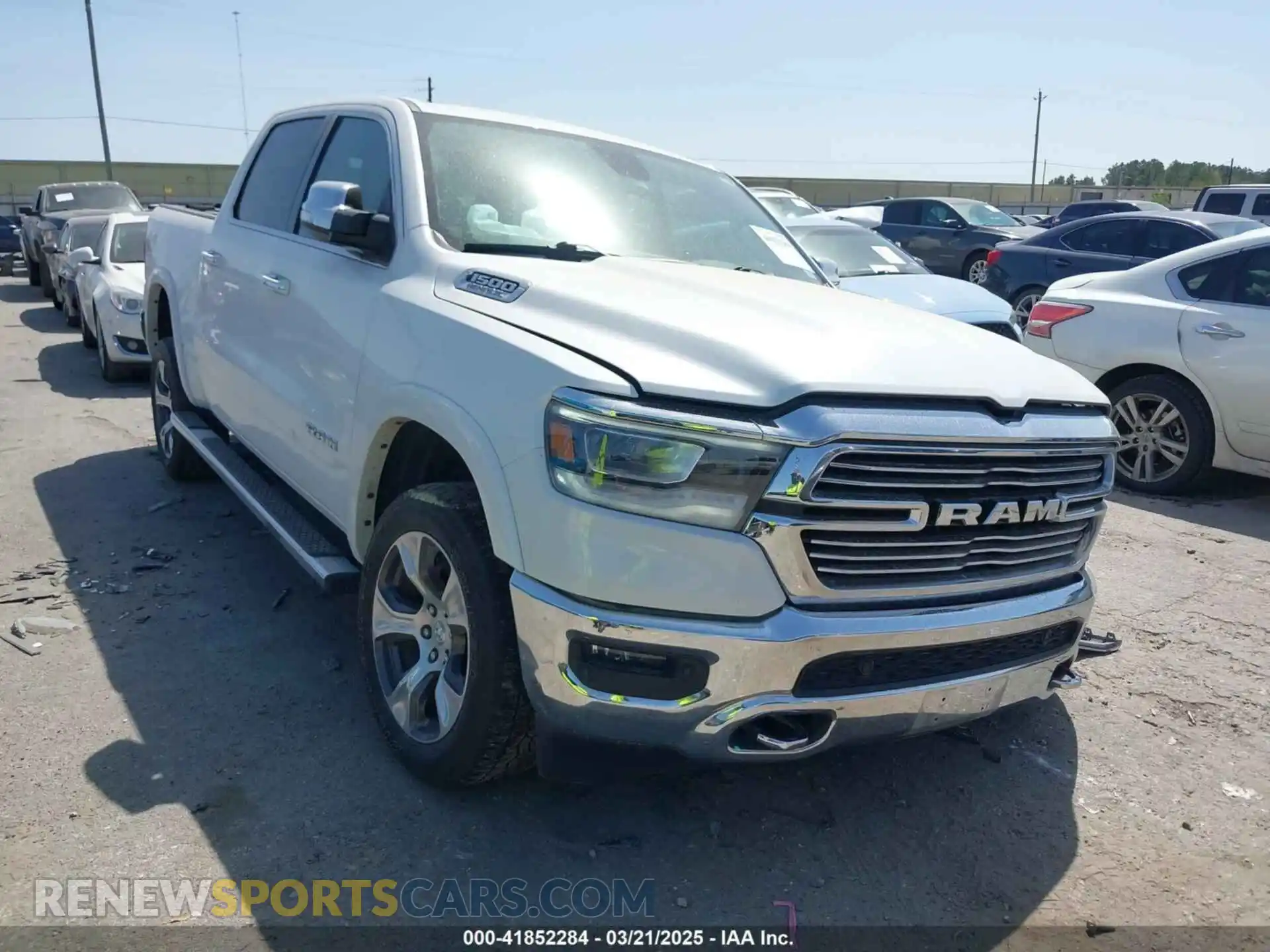 1 Photograph of a damaged car 1C6SRFJT0LN151641 RAM 1500 2020