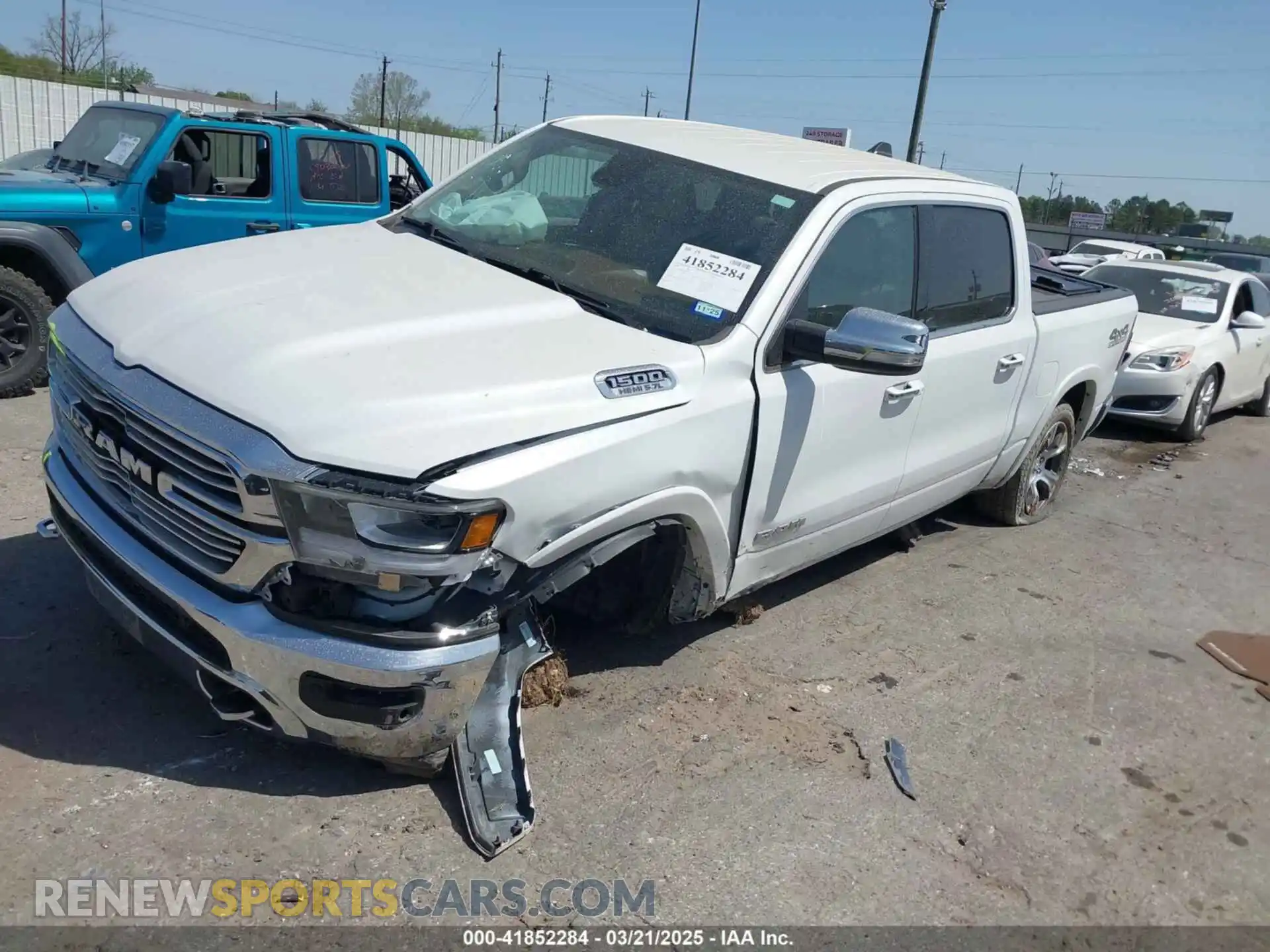 2 Photograph of a damaged car 1C6SRFJT0LN151641 RAM 1500 2020