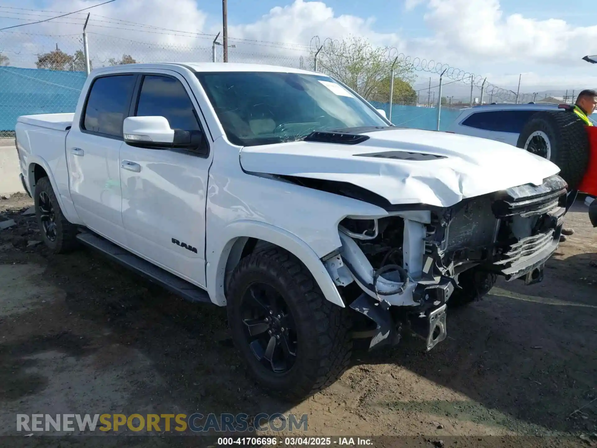 1 Photograph of a damaged car 1C6SRFJT0LN384189 RAM 1500 2020