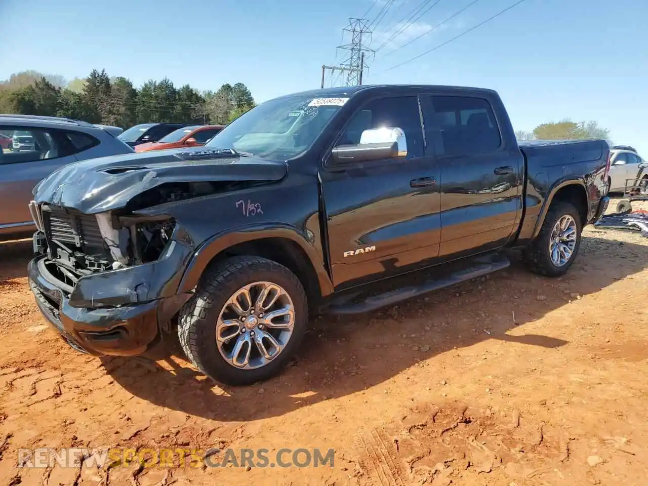 1 Photograph of a damaged car 1C6SRFJT2LN325273 RAM 1500 2020