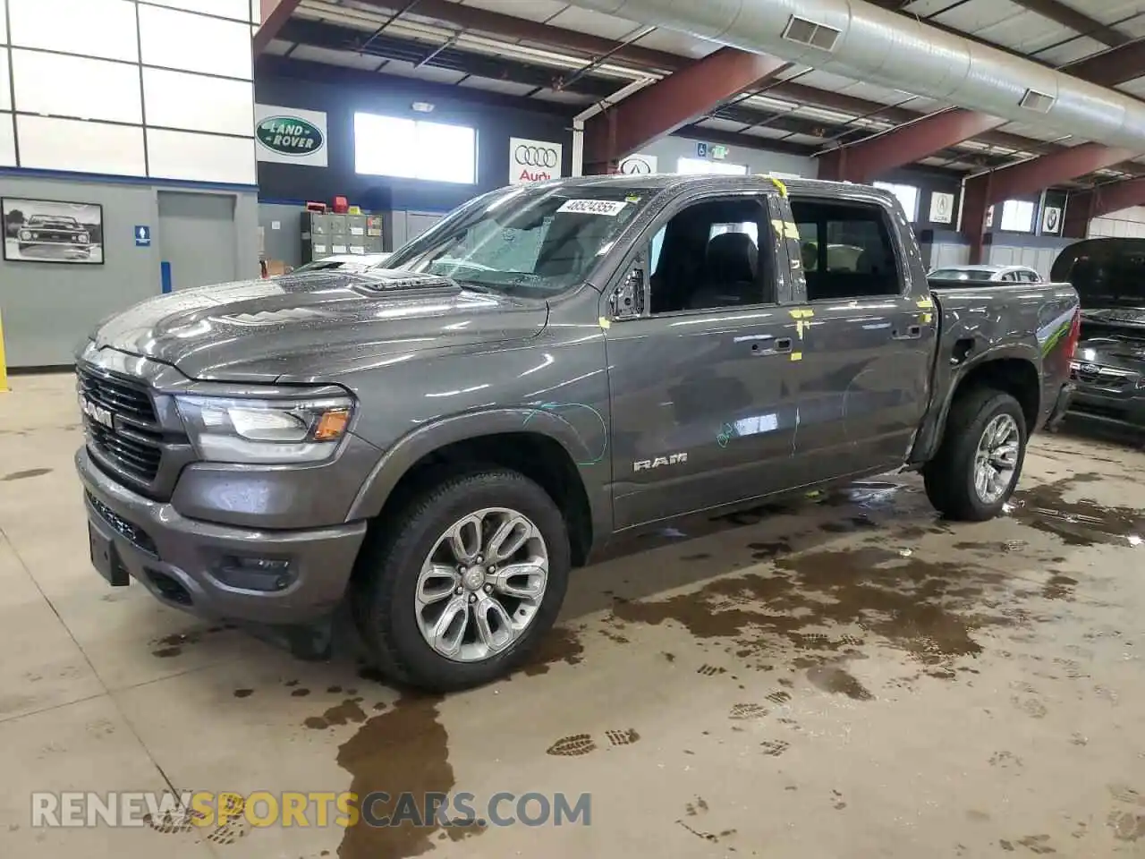 1 Photograph of a damaged car 1C6SRFJT4LN324870 RAM 1500 2020