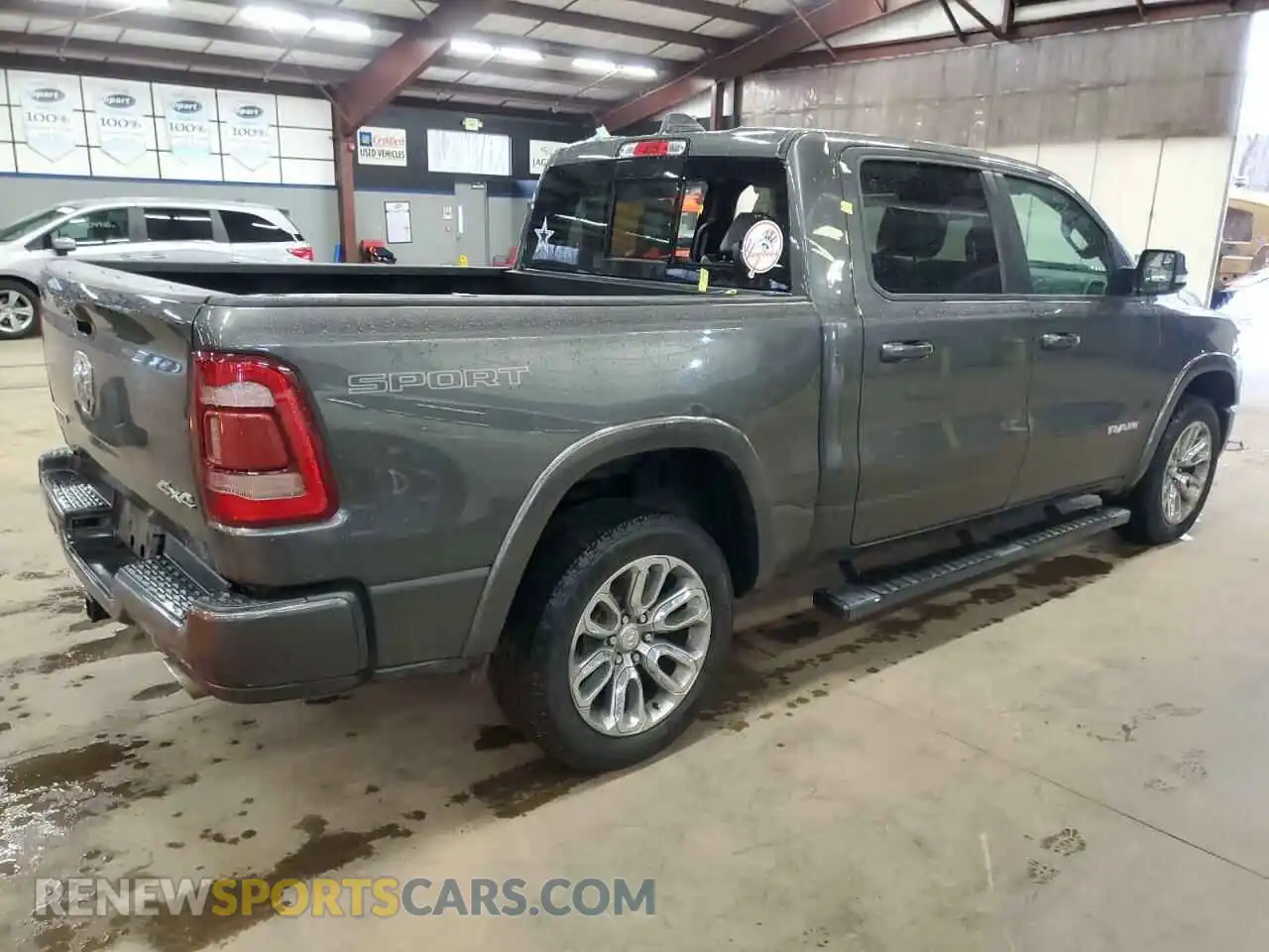 3 Photograph of a damaged car 1C6SRFJT4LN324870 RAM 1500 2020