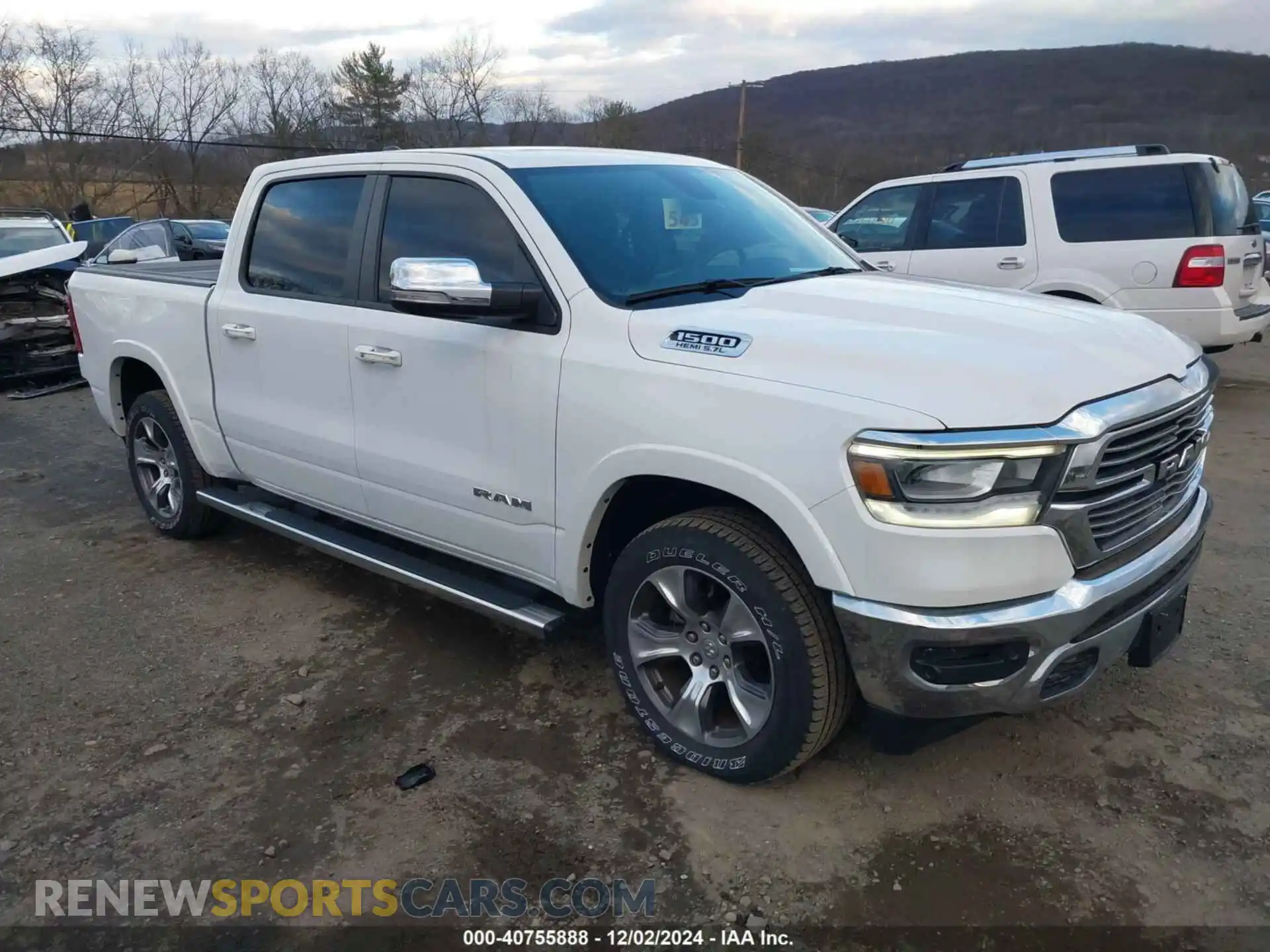 1 Photograph of a damaged car 1C6SRFJT5LN220243 RAM 1500 2020