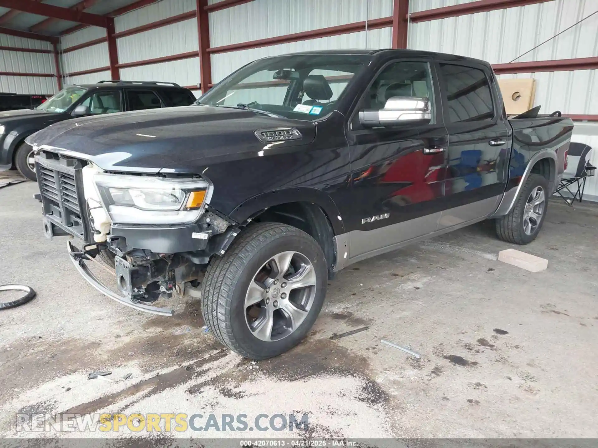 2 Photograph of a damaged car 1C6SRFJT7LN416460 RAM 1500 2020