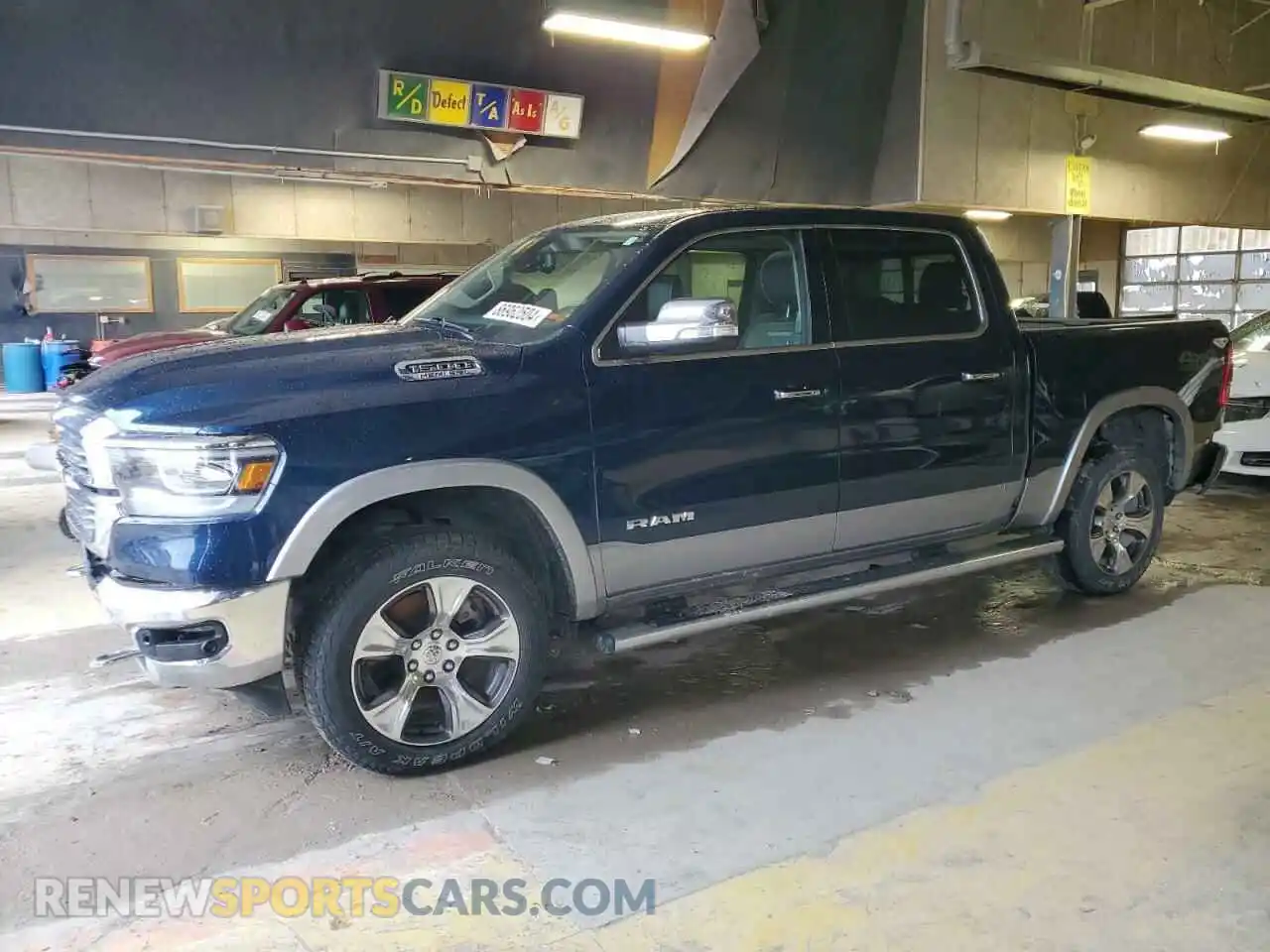 1 Photograph of a damaged car 1C6SRFJT8LN323852 RAM 1500 2020