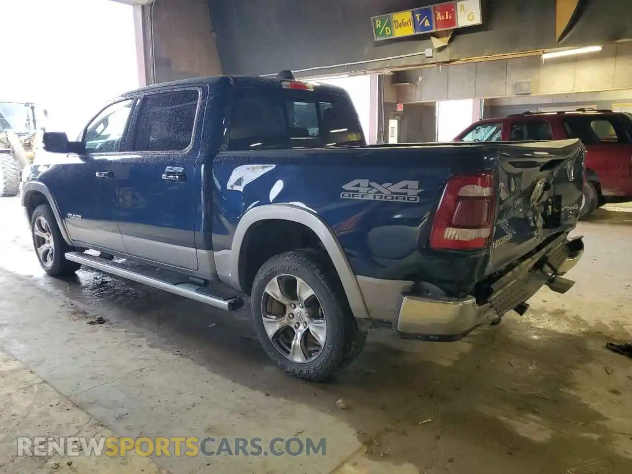 2 Photograph of a damaged car 1C6SRFJT8LN323852 RAM 1500 2020