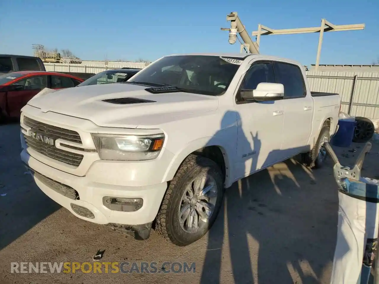 1 Photograph of a damaged car 1C6SRFJTXLN296590 RAM 1500 2020