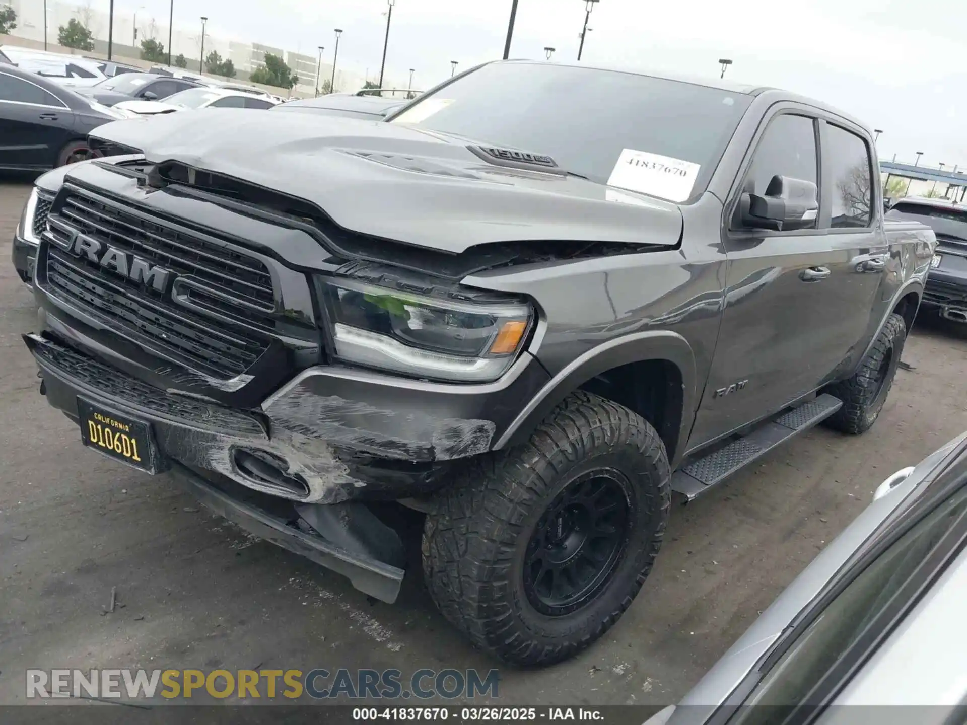 2 Photograph of a damaged car 1C6SRFJTXLN323075 RAM 1500 2020