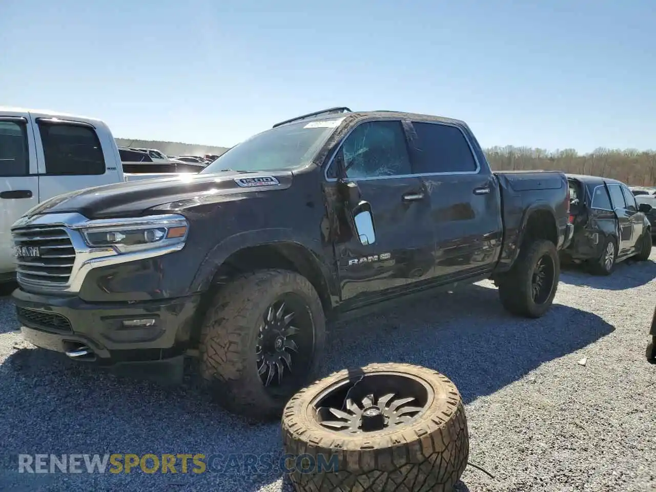1 Photograph of a damaged car 1C6SRFKM3LN272302 RAM 1500 2020
