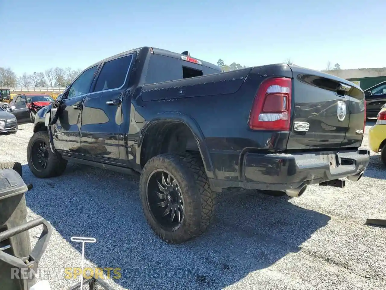 2 Photograph of a damaged car 1C6SRFKM3LN272302 RAM 1500 2020