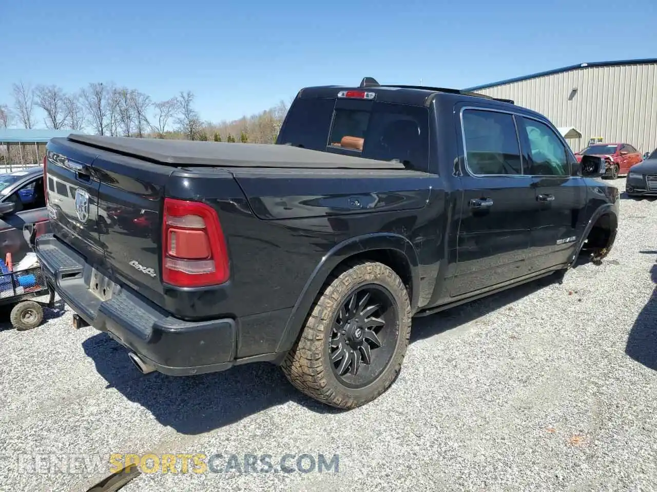 3 Photograph of a damaged car 1C6SRFKM3LN272302 RAM 1500 2020