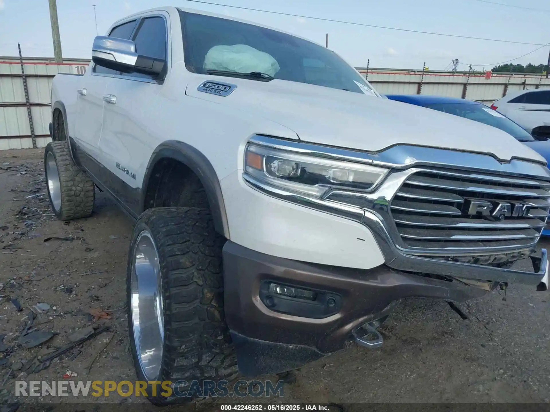 1 Photograph of a damaged car 1C6SRFKT0LN127449 RAM 1500 2020