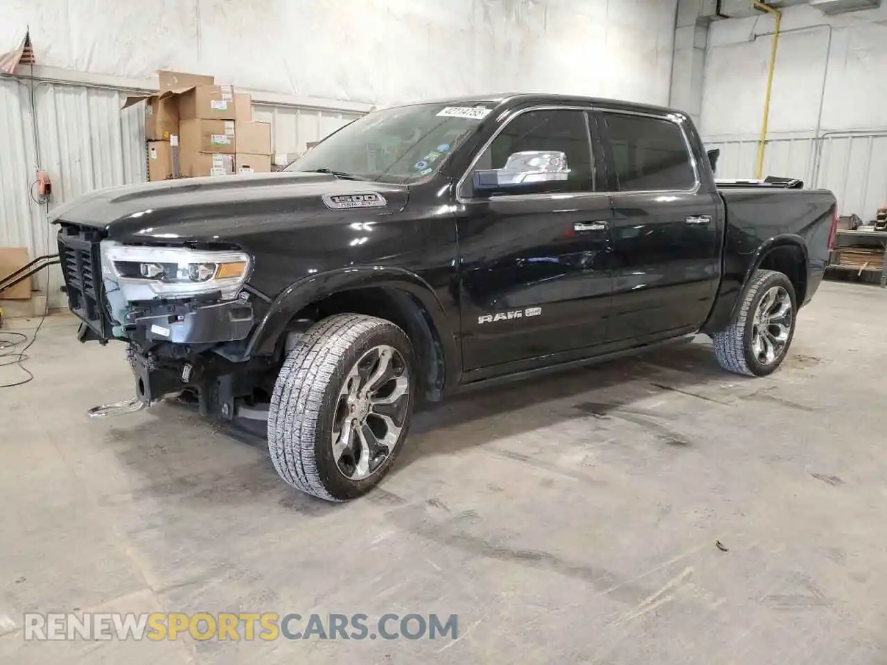 1 Photograph of a damaged car 1C6SRFKT3LN201088 RAM 1500 2020