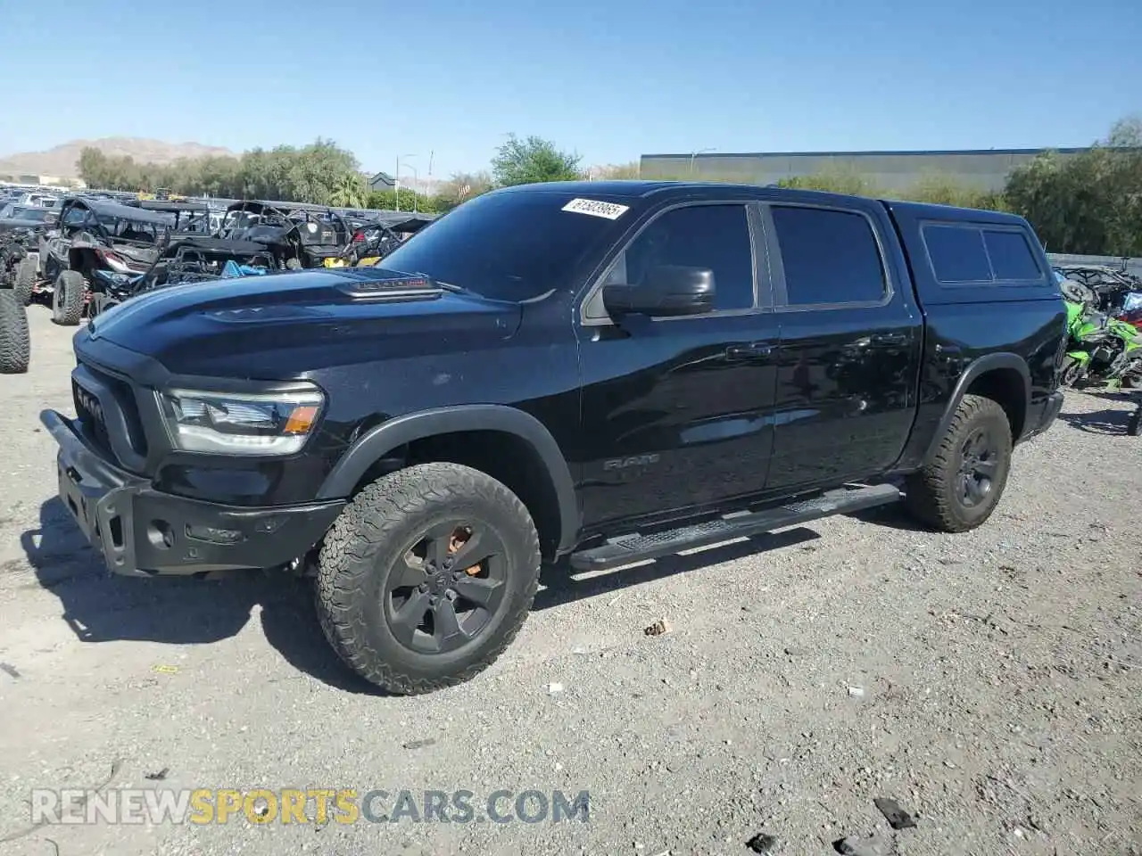1 Photograph of a damaged car 1C6SRFLM6LN286161 RAM 1500 2020