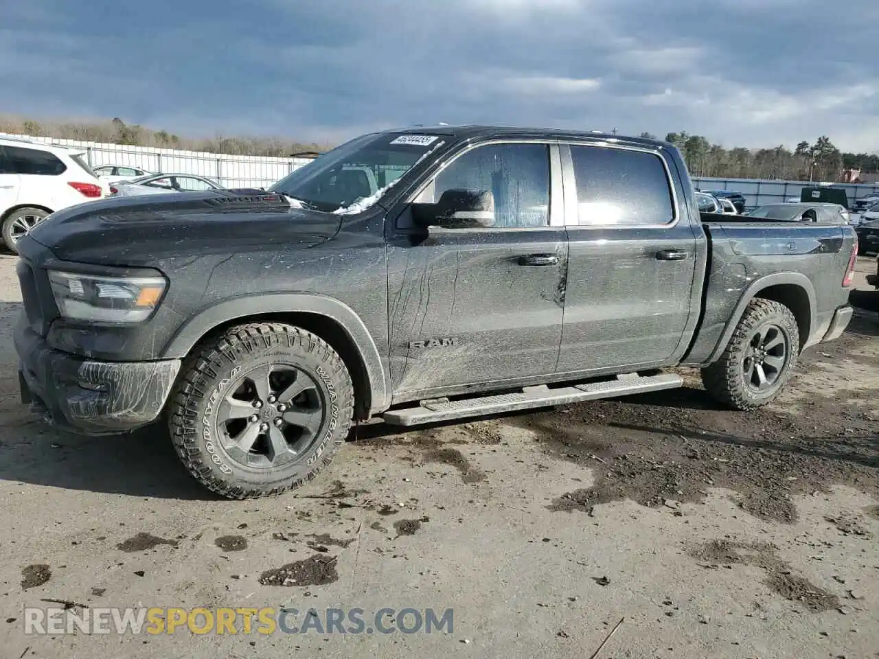 1 Photograph of a damaged car 1C6SRFLM6LN306991 RAM 1500 2020