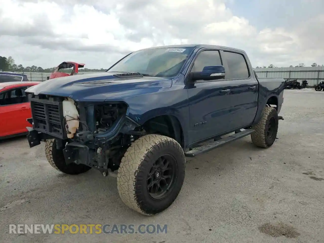 1 Photograph of a damaged car 1C6SRFLT0LN112884 RAM 1500 2020