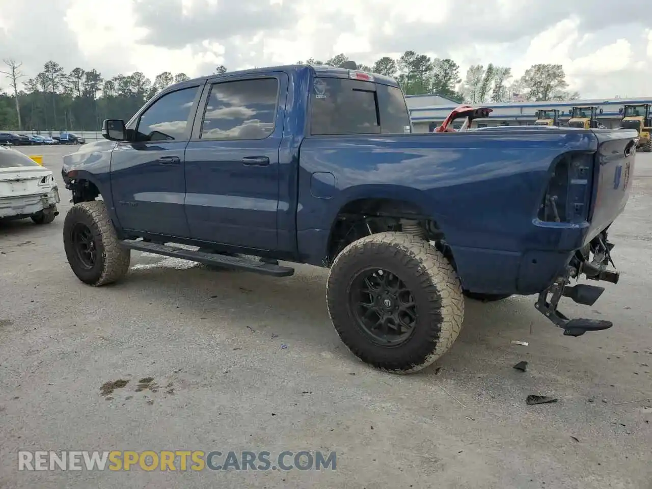 2 Photograph of a damaged car 1C6SRFLT0LN112884 RAM 1500 2020