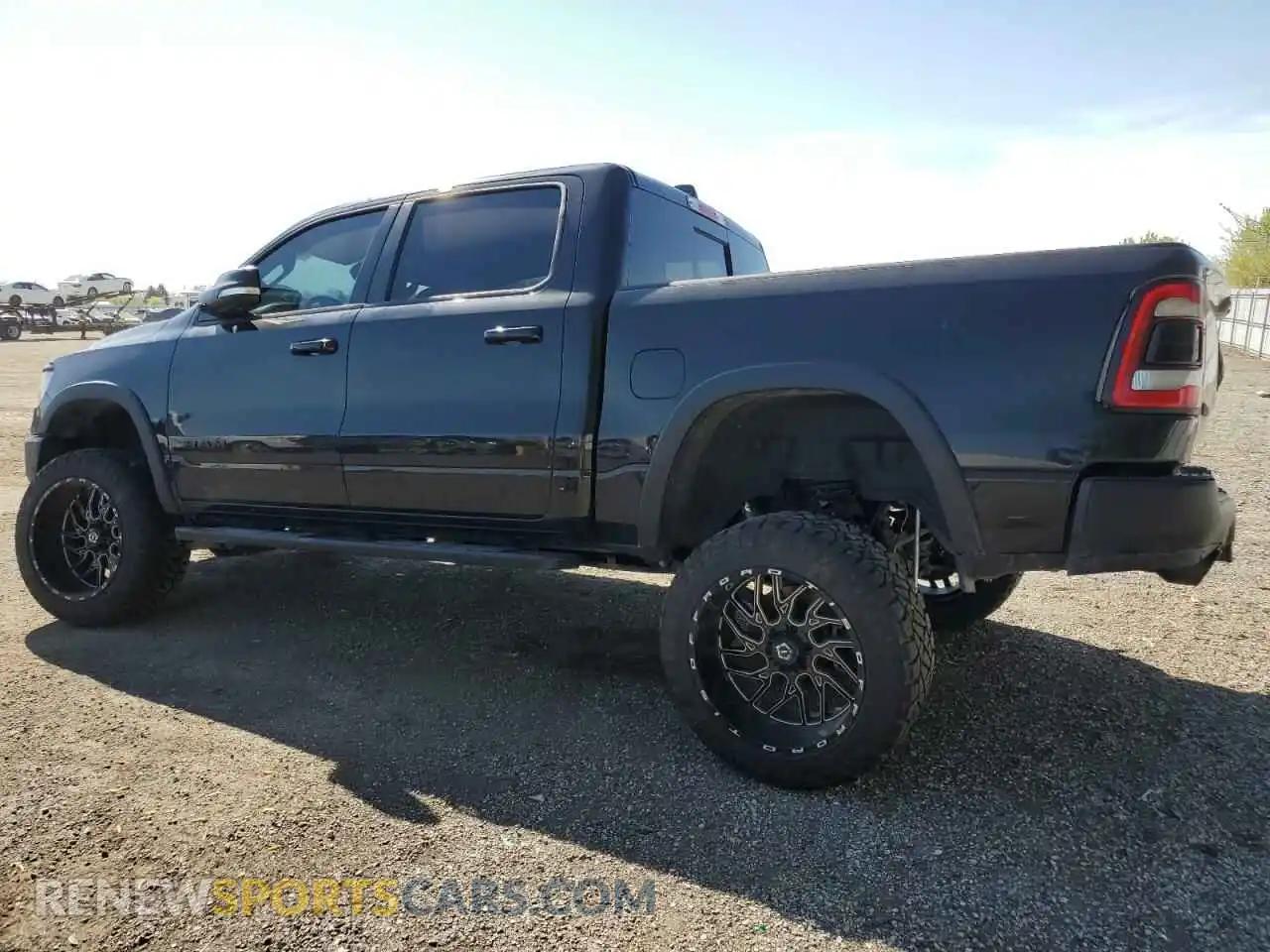 2 Photograph of a damaged car 1C6SRFLT0LN244883 RAM 1500 2020