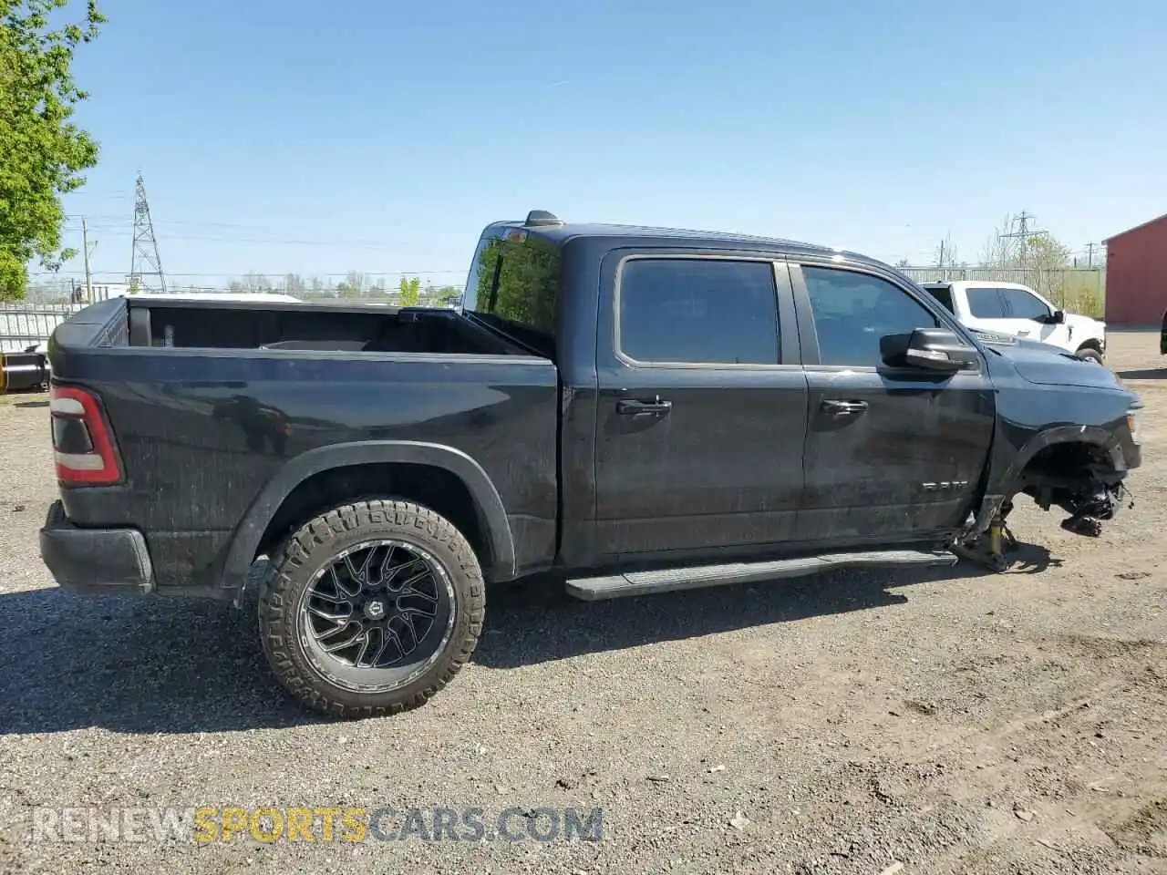3 Photograph of a damaged car 1C6SRFLT0LN244883 RAM 1500 2020