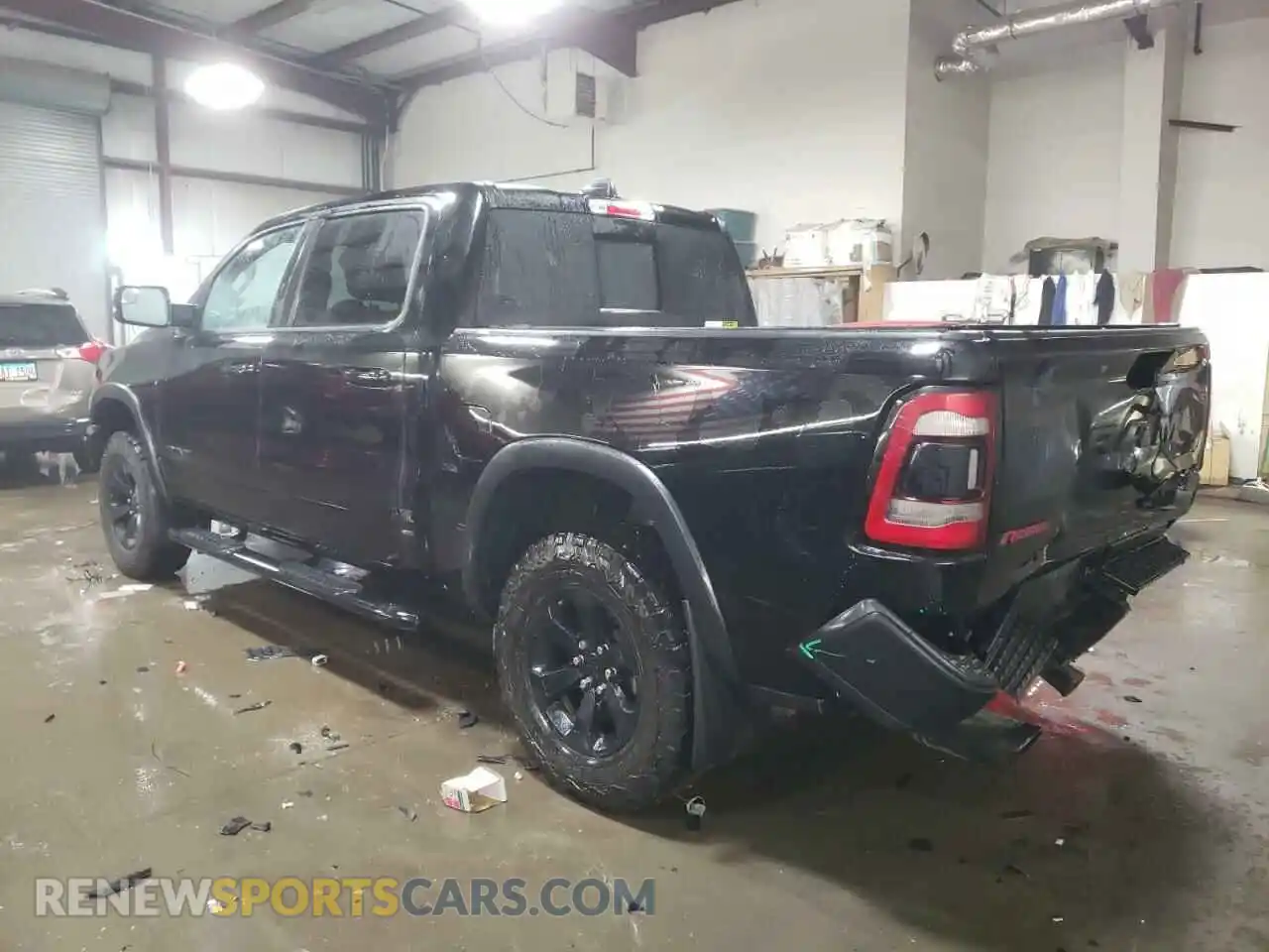 2 Photograph of a damaged car 1C6SRFLT0LN293467 RAM 1500 2020