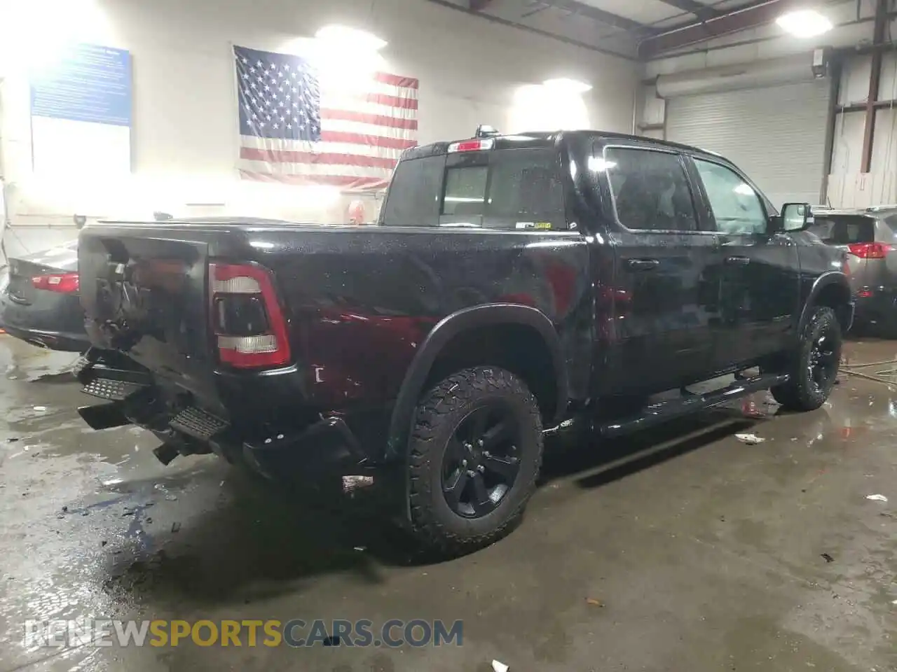 3 Photograph of a damaged car 1C6SRFLT0LN293467 RAM 1500 2020