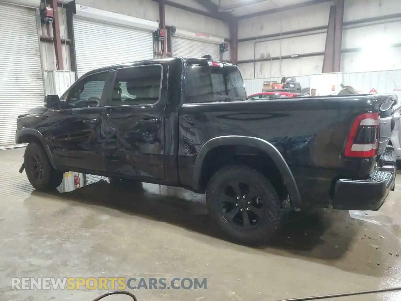 2 Photograph of a damaged car 1C6SRFLT0LN356986 RAM 1500 2020