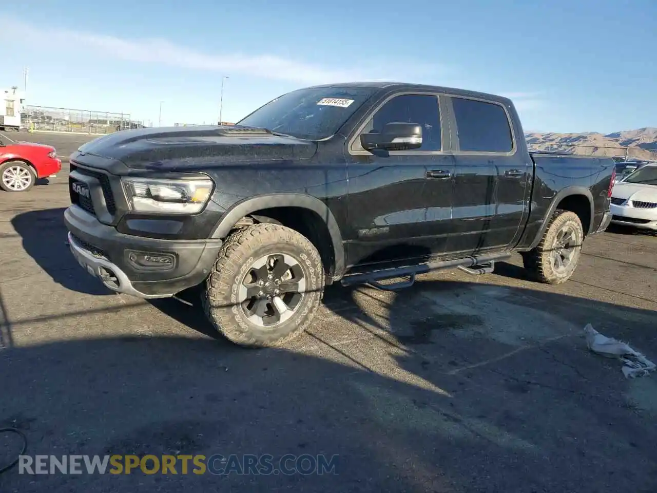 1 Photograph of a damaged car 1C6SRFLT2LN233562 RAM 1500 2020