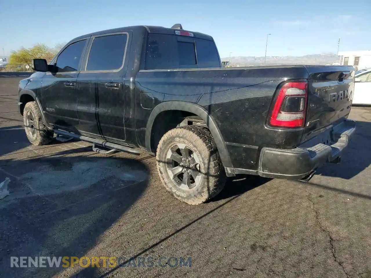 2 Photograph of a damaged car 1C6SRFLT2LN233562 RAM 1500 2020