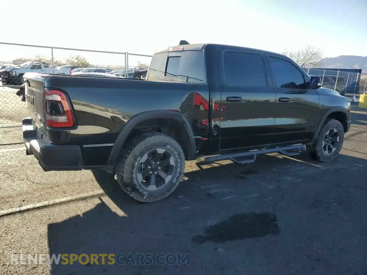 3 Photograph of a damaged car 1C6SRFLT2LN233562 RAM 1500 2020