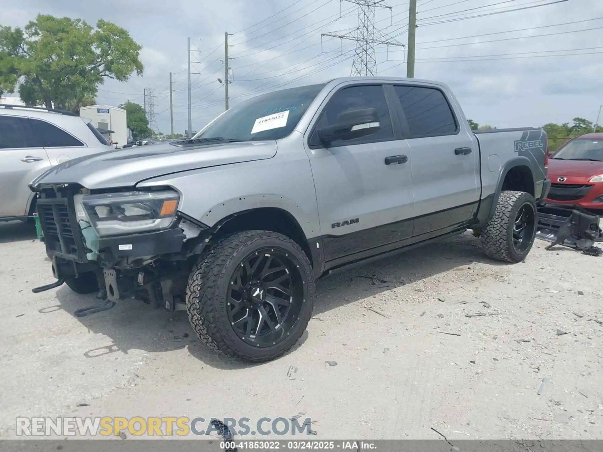2 Photograph of a damaged car 1C6SRFLT3LN142719 RAM 1500 2020
