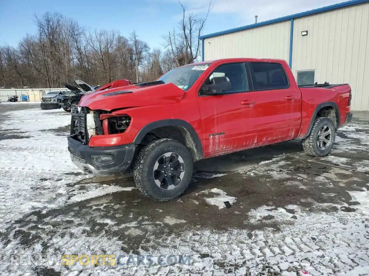 1 Photograph of a damaged car 1C6SRFLT5LN151275 RAM 1500 2020