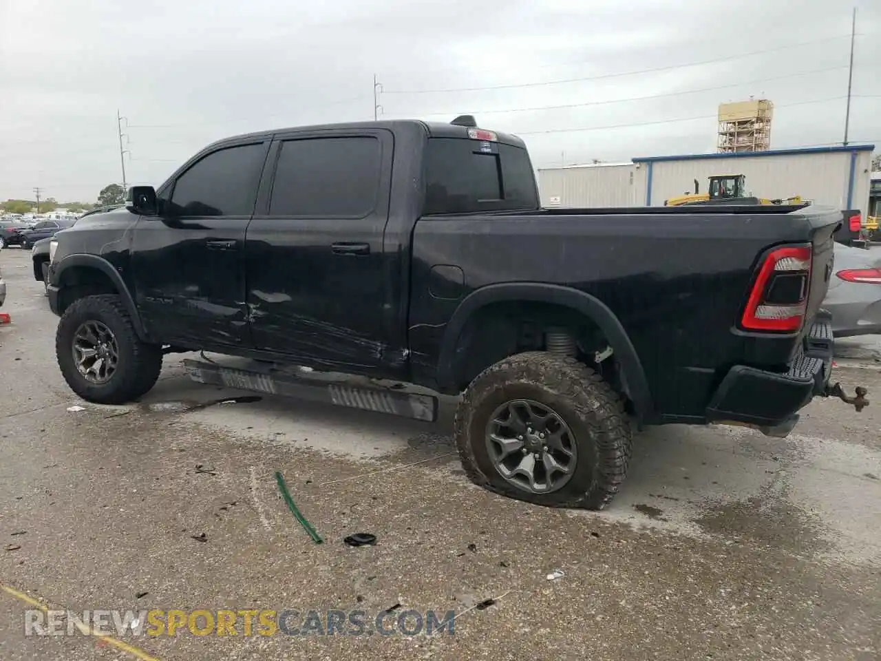 2 Photograph of a damaged car 1C6SRFLT5LN402232 RAM 1500 2020