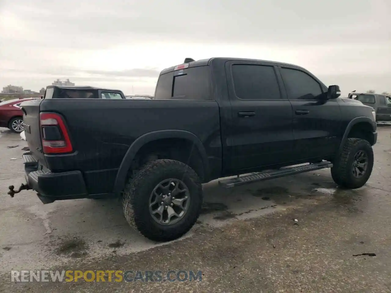 3 Photograph of a damaged car 1C6SRFLT5LN402232 RAM 1500 2020