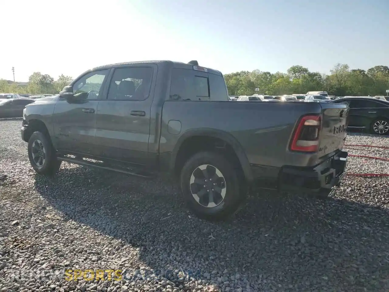 2 fotografías del automóvil dañado 1C6SRFLT6LN360847 RAM 1500 2020