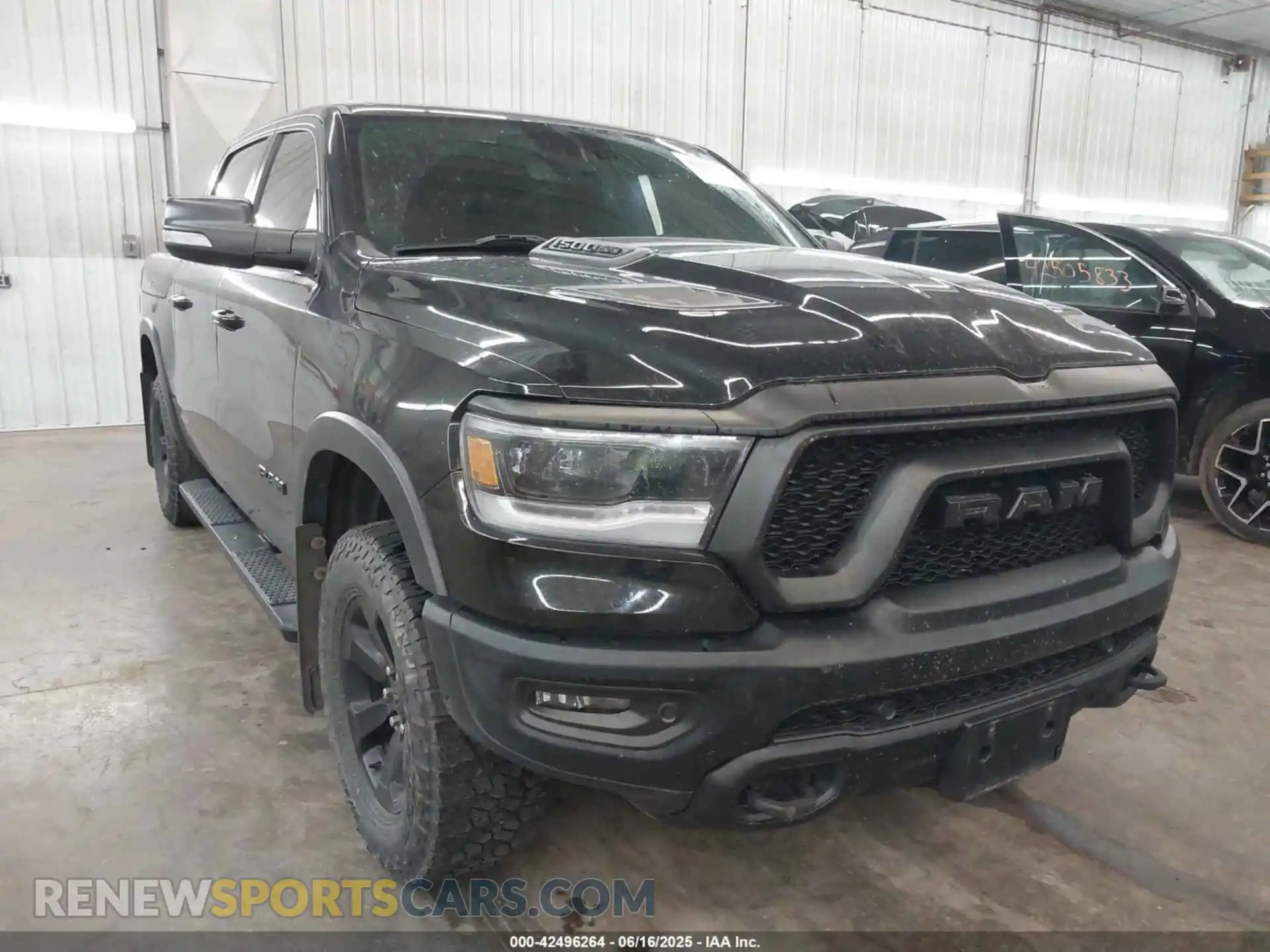 1 Photograph of a damaged car 1C6SRFLT7LN187484 RAM 1500 2020