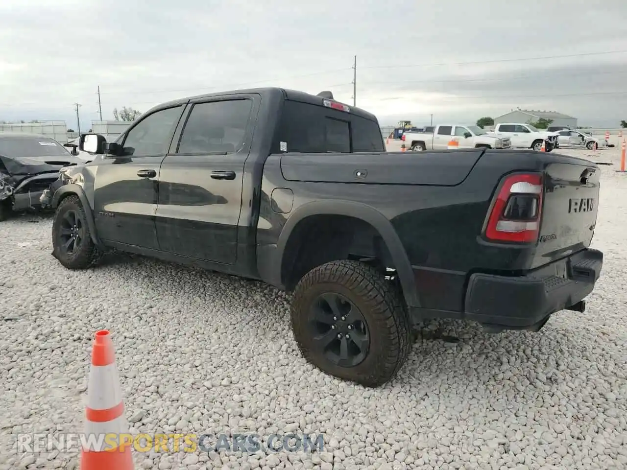 2 Photograph of a damaged car 1C6SRFLT7LN218944 RAM 1500 2020
